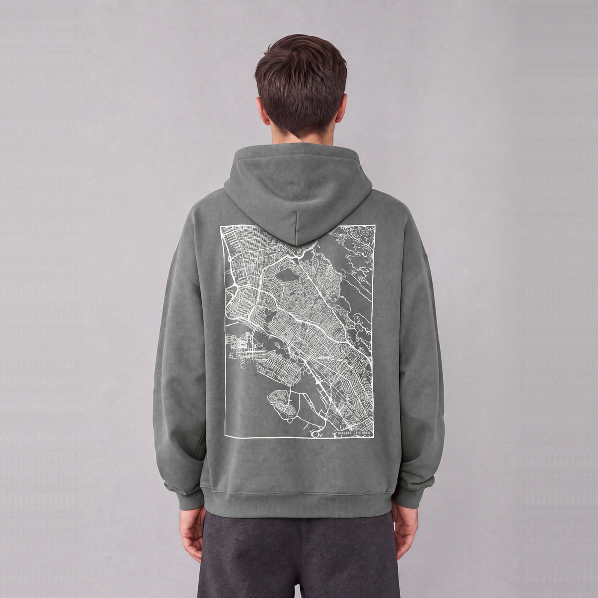 Oakland map hoodie, back print on model - Gray