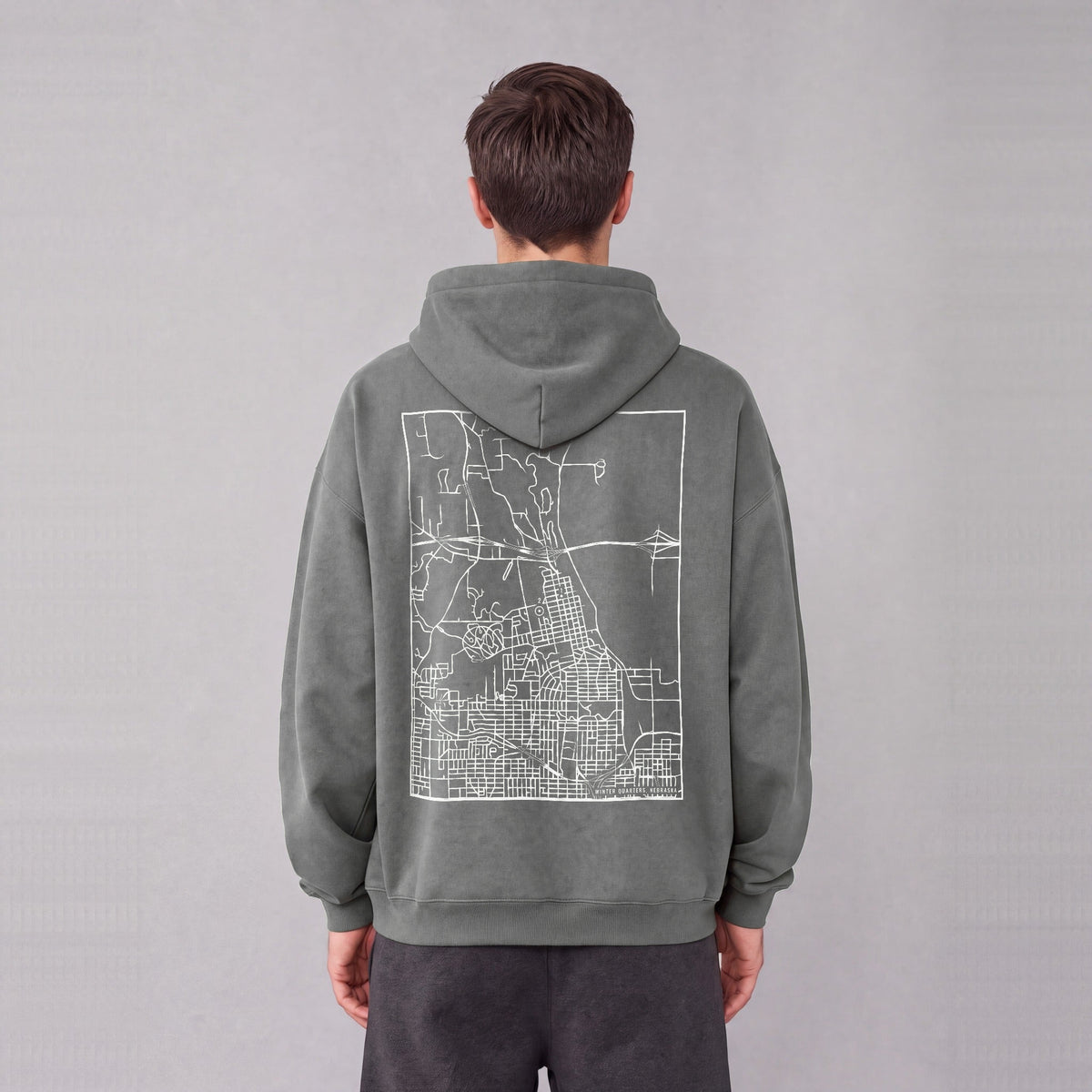 Winter Quarters map hoodie, back print on model - Gray