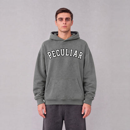 "Peculiar" collegiate hoodie front print on model - Gray