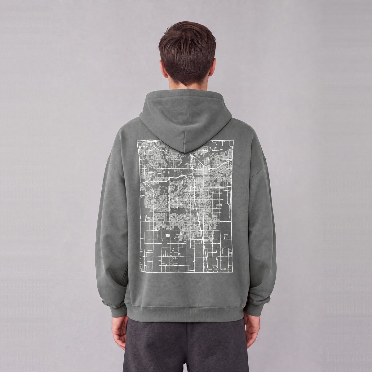 Bakersfield map hoodie, back print on model - Gray