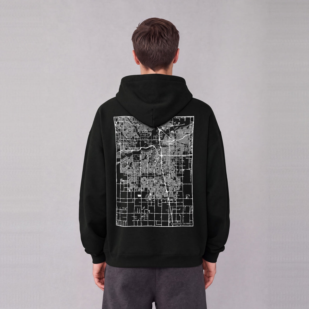 Bakersfield map hoodie, back print on model - Black