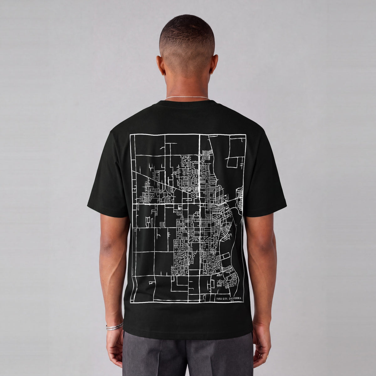 Yuba City map tee, back print on model - Black