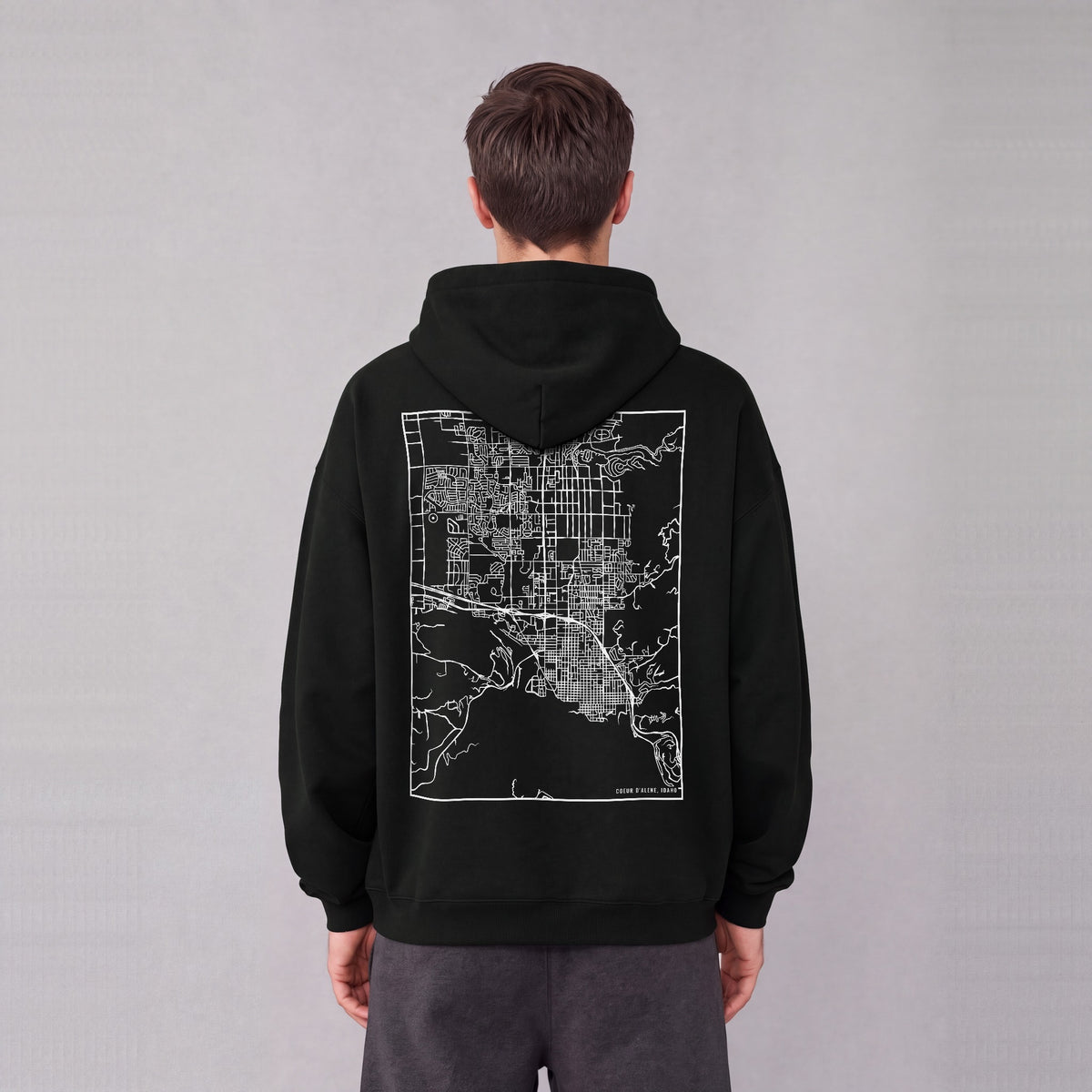 Coeur d'Alene map hoodie, back print on model - Black