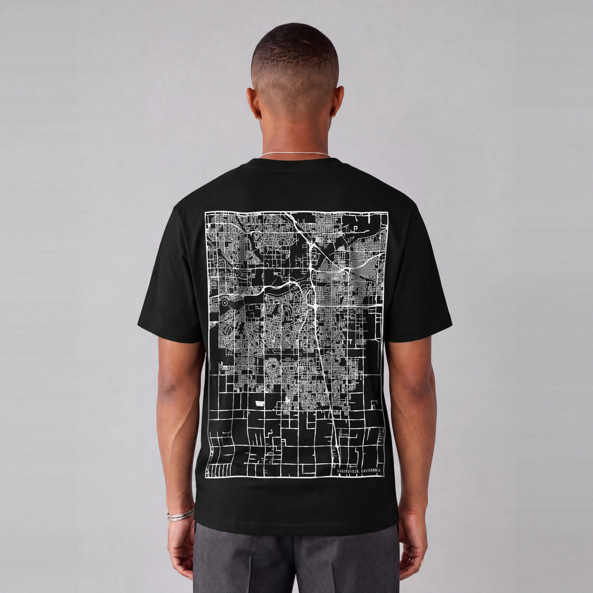 Bakersfield map tee, back print on model - Black