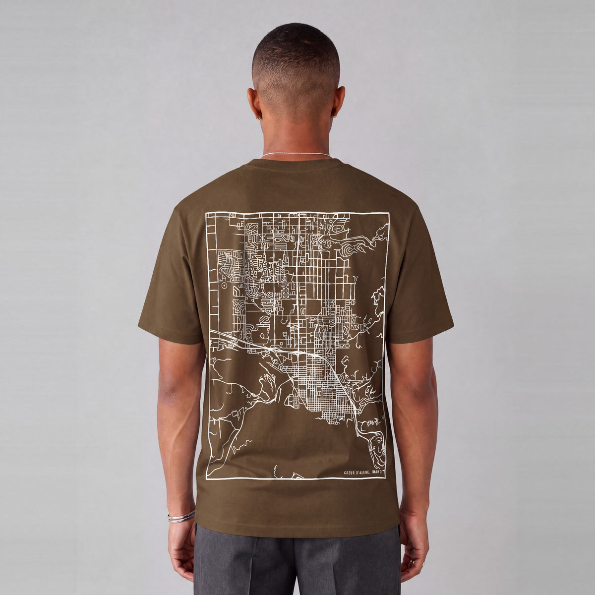 Coeur d'Alene map tee, back print on model - Coffee