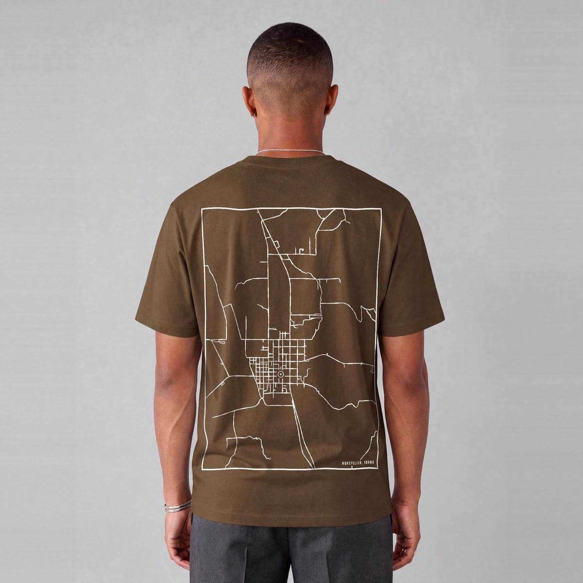 Montpelier map tee, back print on model - Coffee