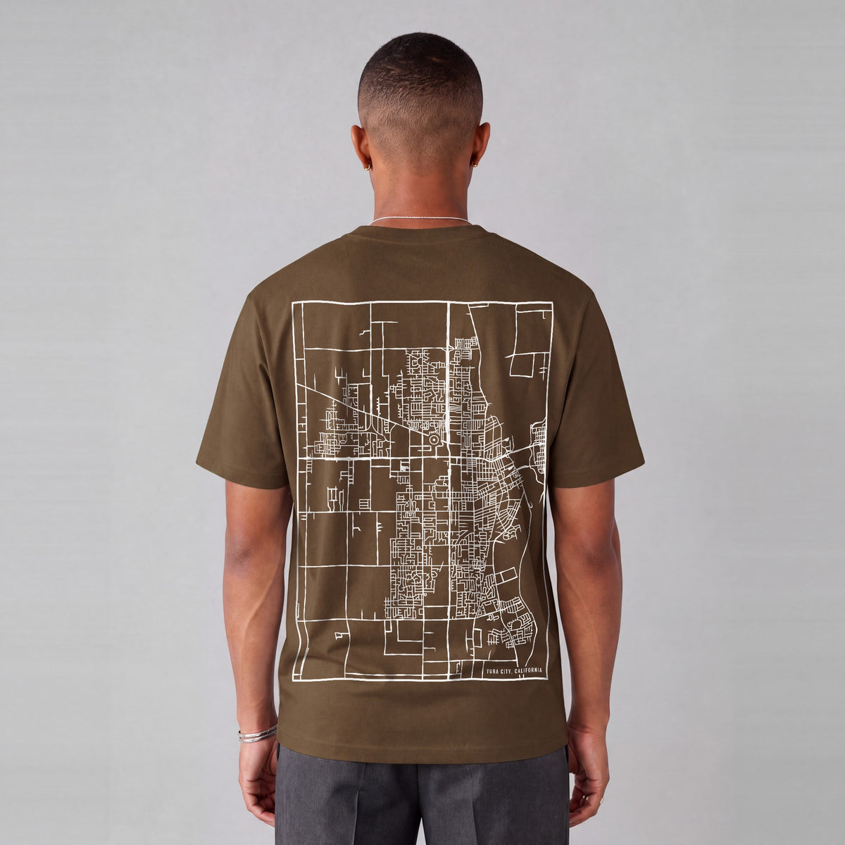 Yuba City map tee, back print on model - Coffee