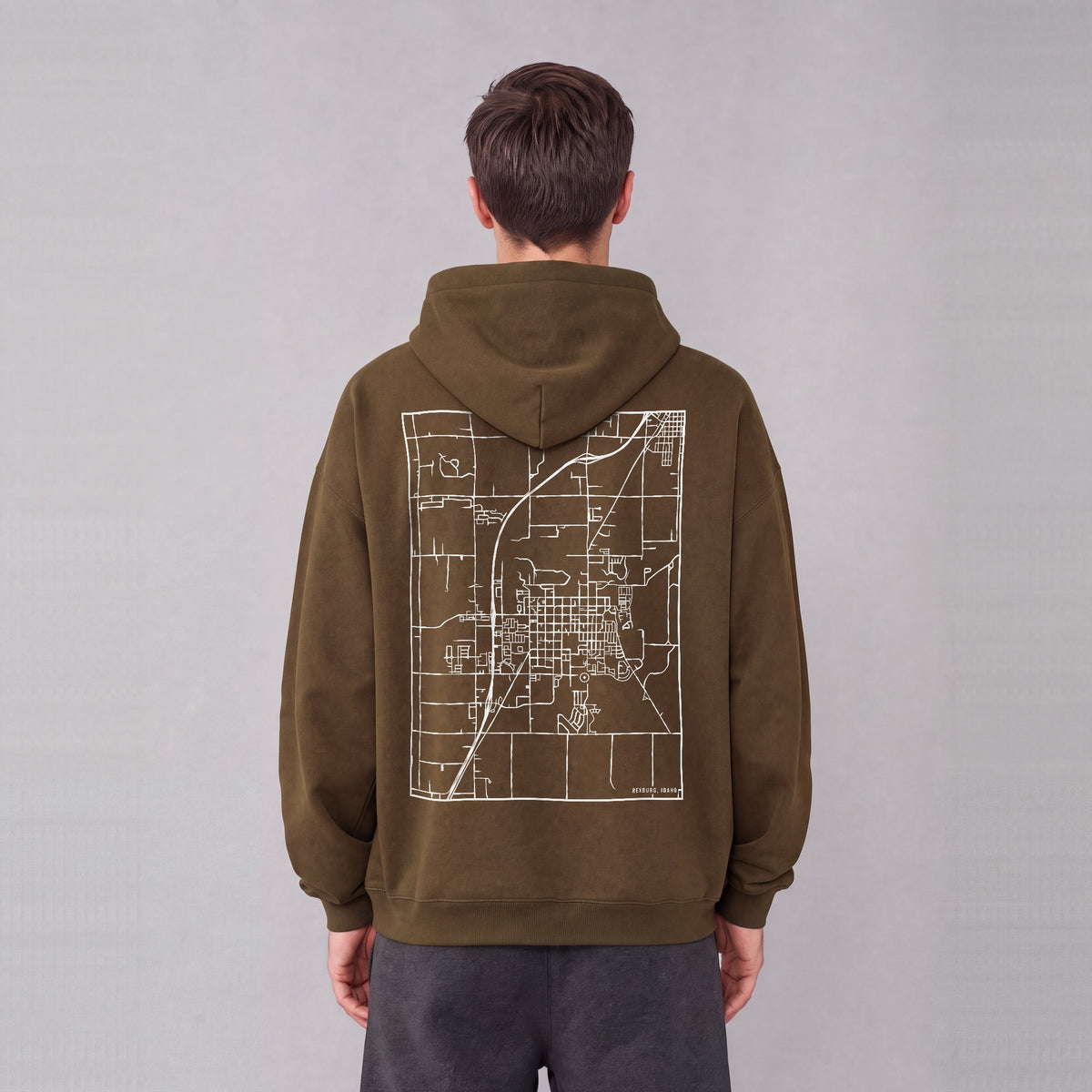 Rexburg map hoodie, back print on model - Coffee