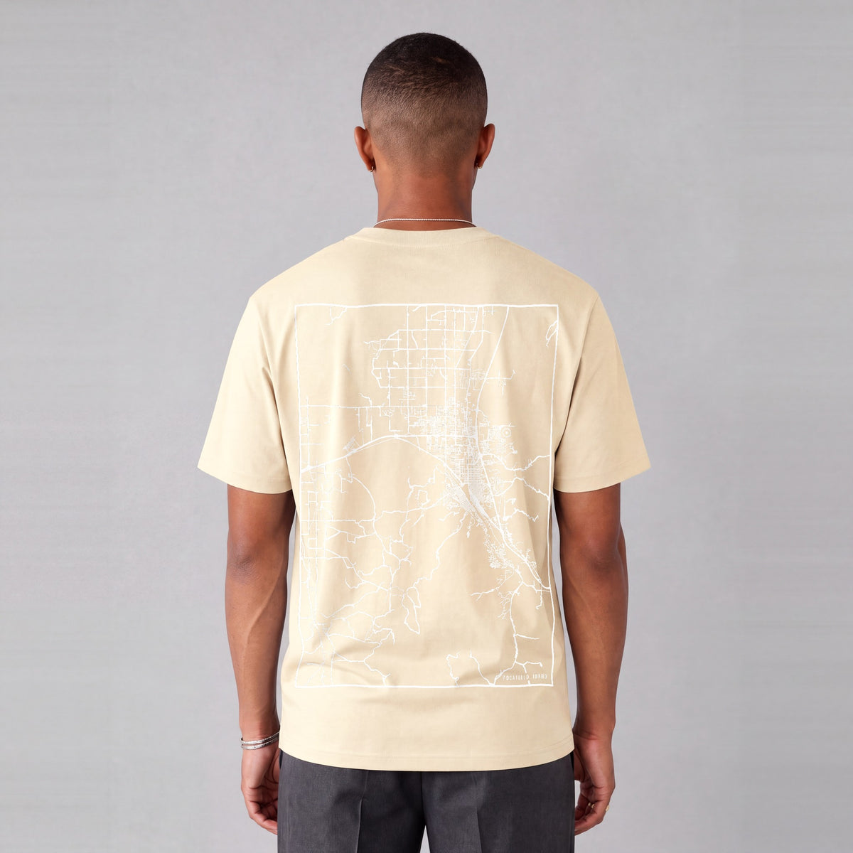 Pocatello map tee, back print on model - Cream