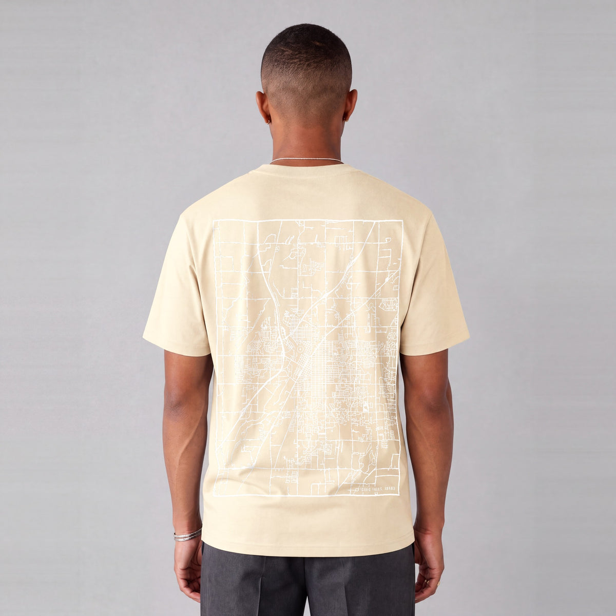 Idaho Falls map tee, back print on model - Cream