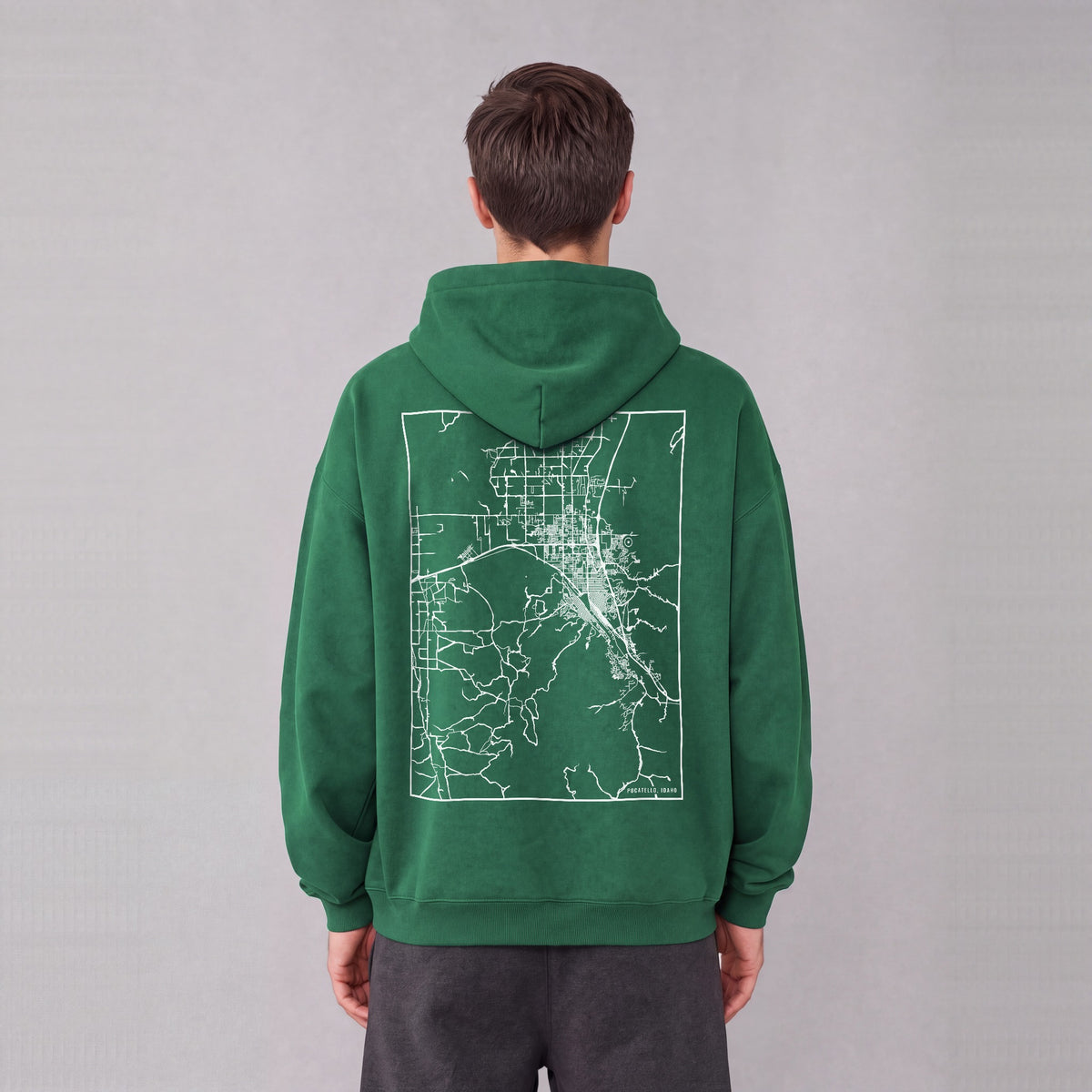 Pocatello map hoodie, back print on model - Eden Green