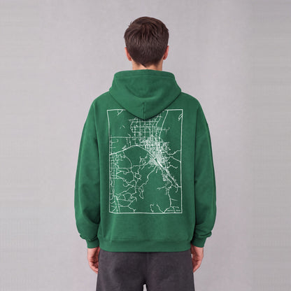 Pocatello map hoodie, back print on model - Eden Green