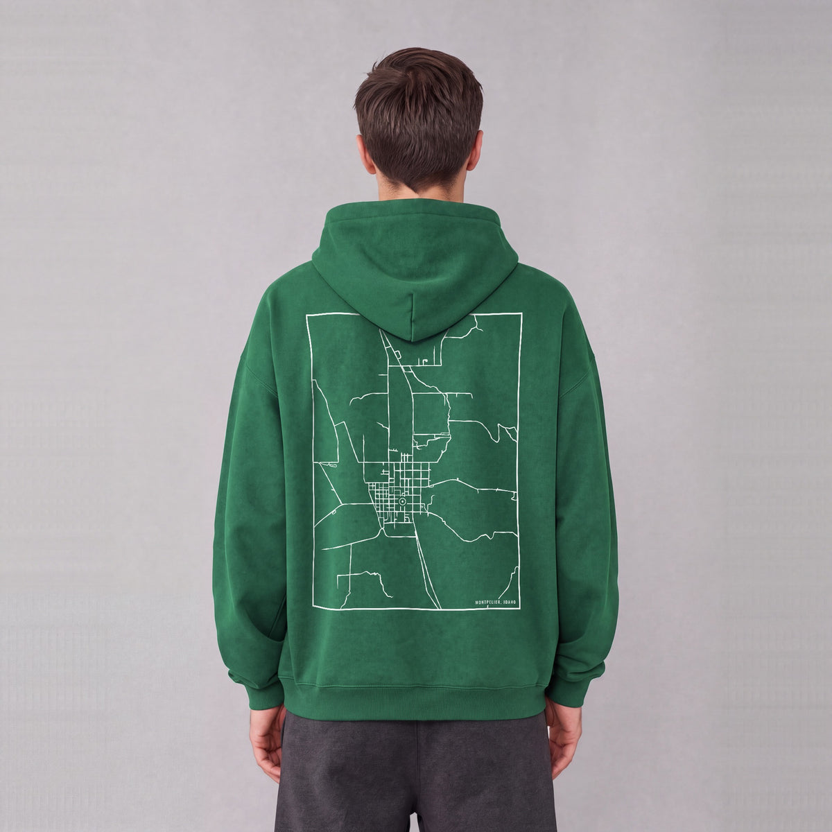 Montpelier map hoodie, back print on model - Eden Green