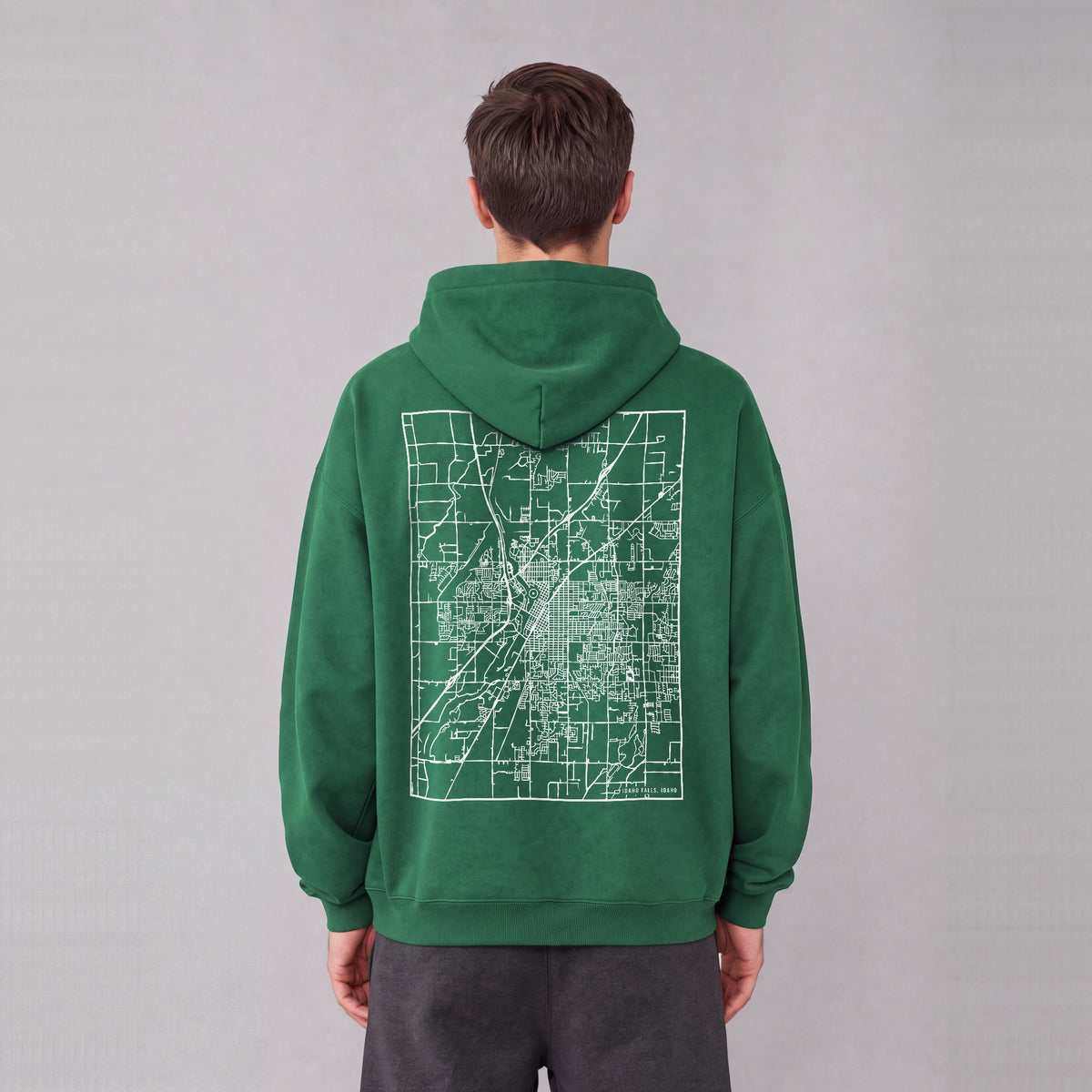 Idaho Falls map hoodie, back print on model - Eden Green