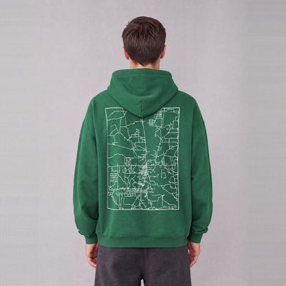 Snowflake map hoodie, back print on model - Eden Green