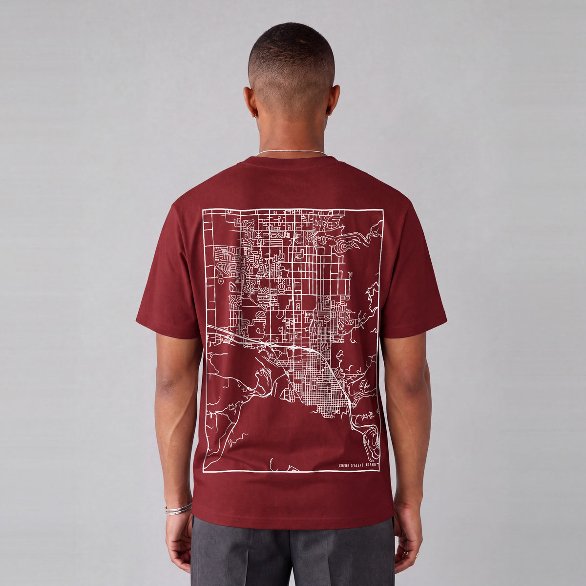 Coeur d'Alene map tee, back print on model - Maroon