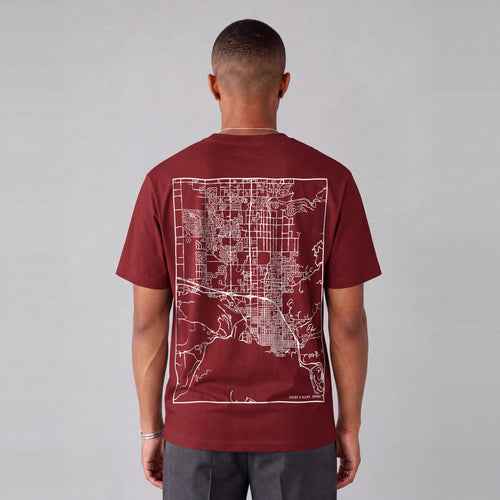 Coeur d'Alene map tee, back print on model - Maroon