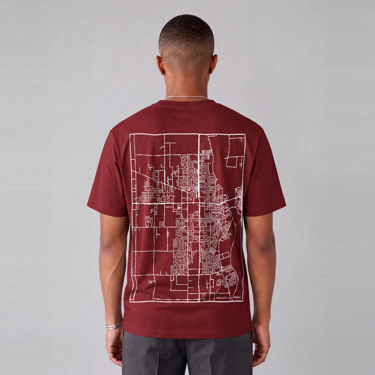 Yuba City map tee, back print on model - Maroon