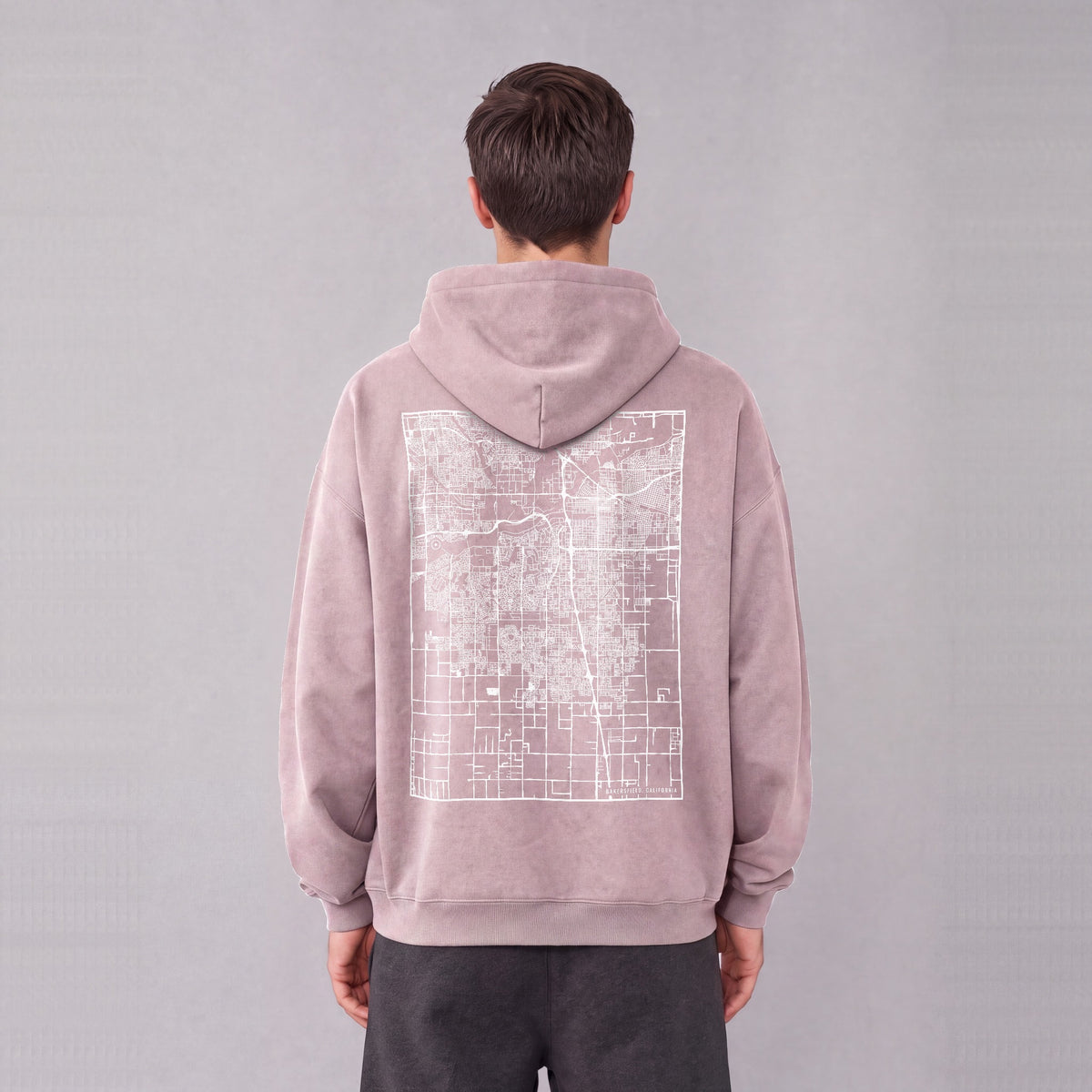 Bakersfield map hoodie, back print on model - Mauve
