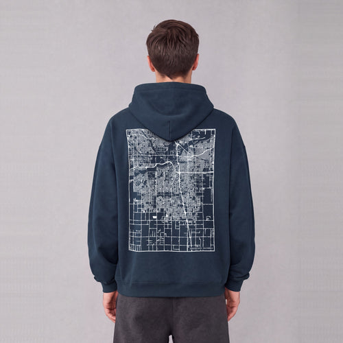 Bakersfield map hoodie, back print on model - Navy Blue