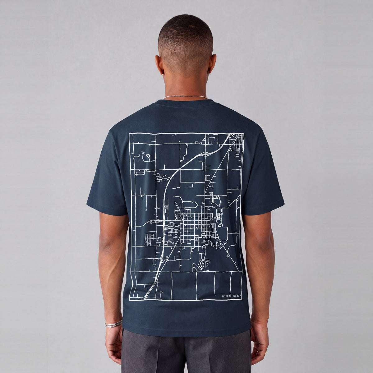 Rexburg map tee, back print on model - Navy Blue