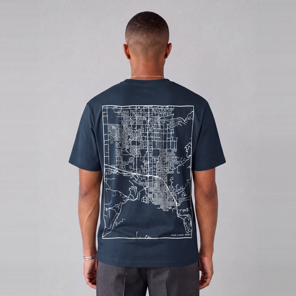 Coeur d'Alene map tee, back print on model - Navy Blue