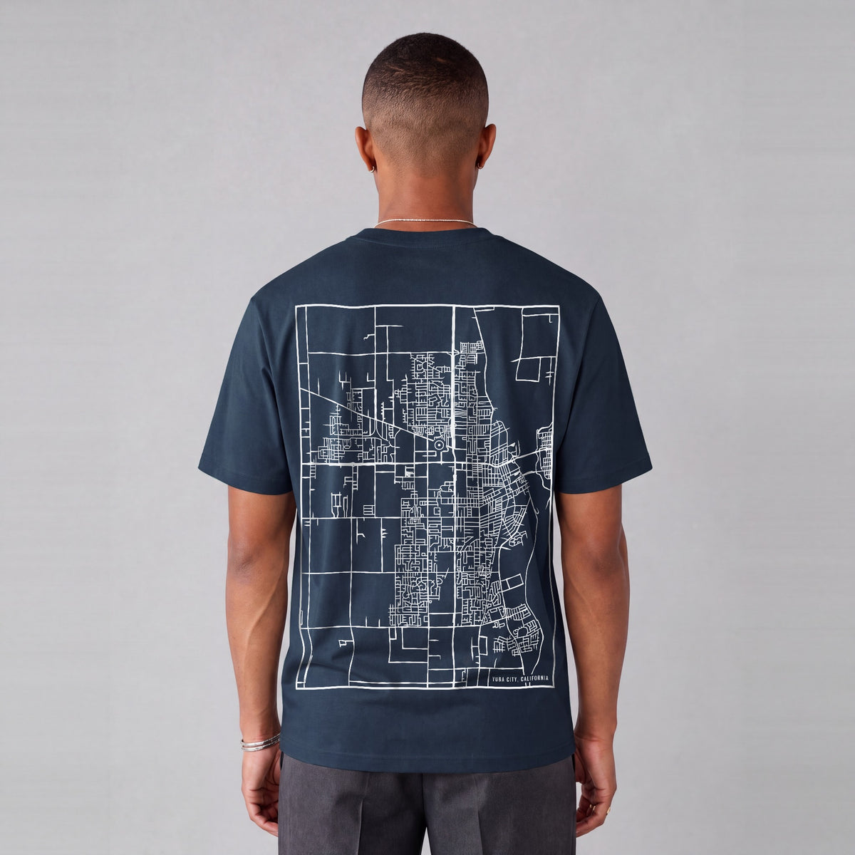 Yuba City map tee, back print on model - Navy Blue