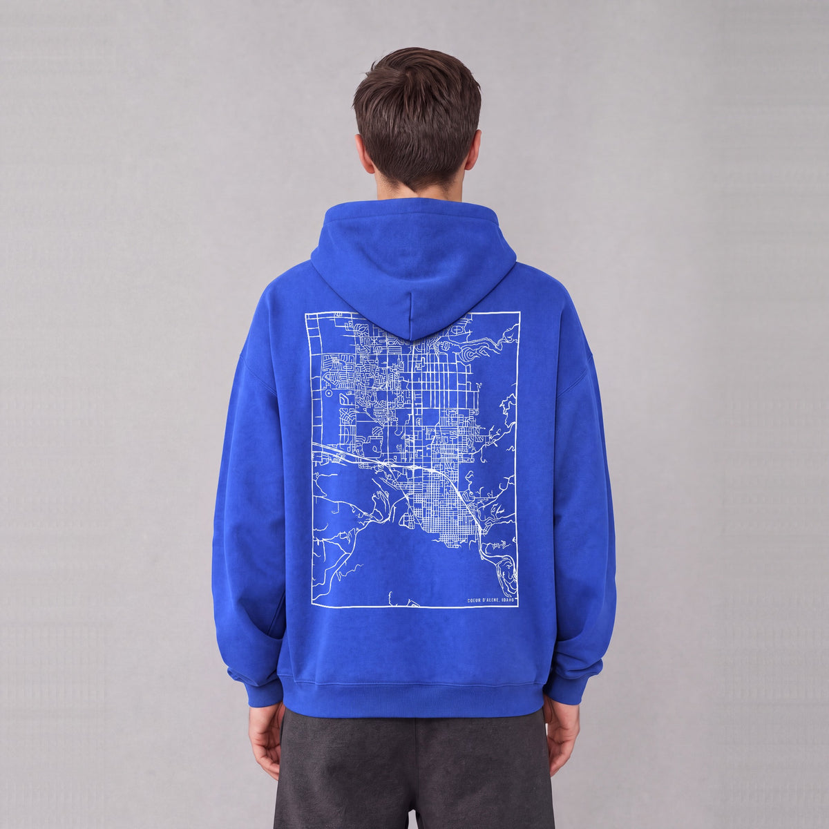 Coeur d'Alene map hoodie, back print on model - Royal Blue