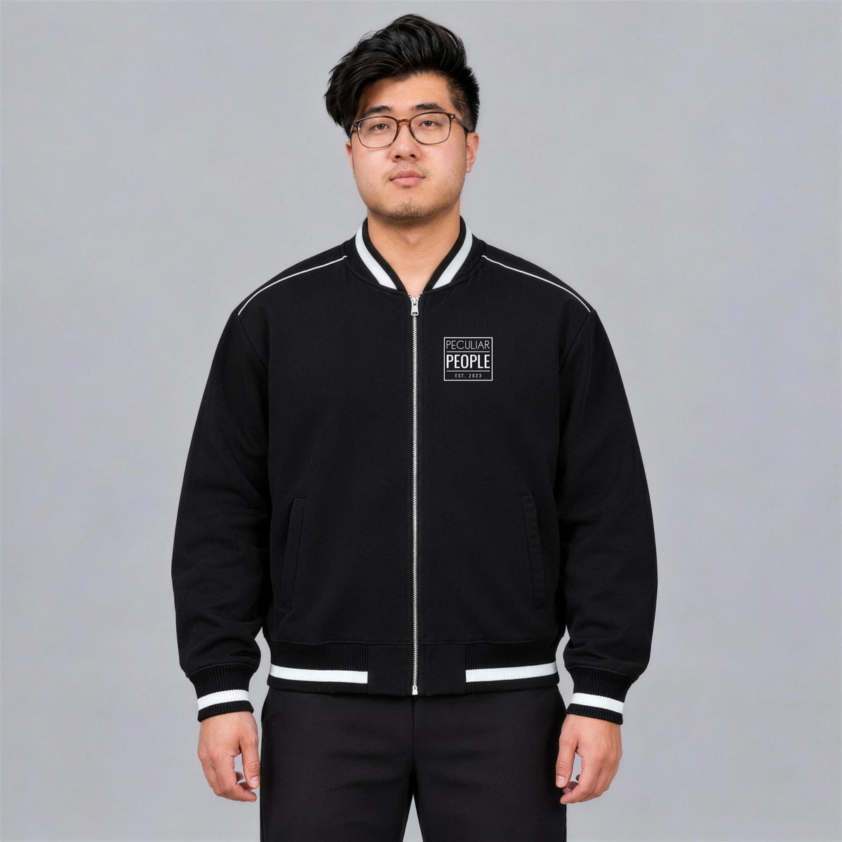 Temple Seal bomber jacket chest logo on model - Black