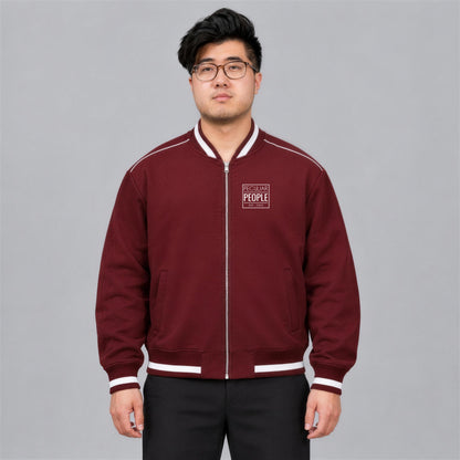Temple Seal bomber jacket chest logo on model - Maroon