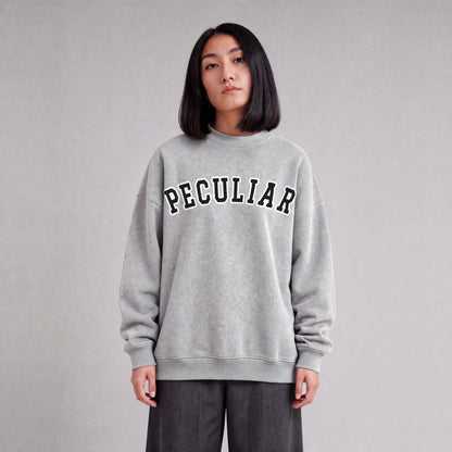 "Peculiar" collegiate sweatshirt front print on model - Heather Gray