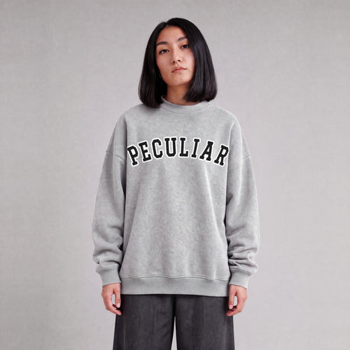 "Peculiar" collegiate sweatshirt front print on model - Heather Gray