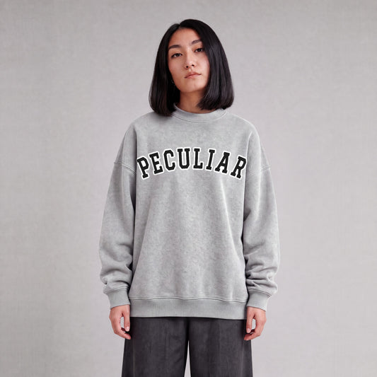 "Peculiar" collegiate sweatshirt front print on model - Heather Gray