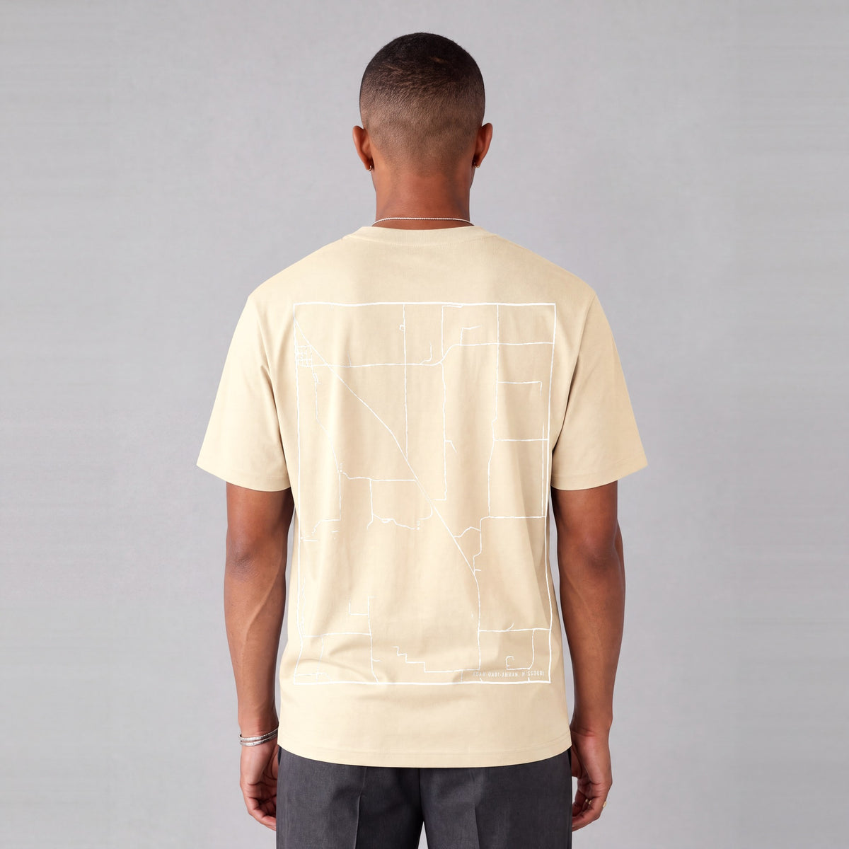 Adam-ondi-Ahman map tee, back print on model - Cream