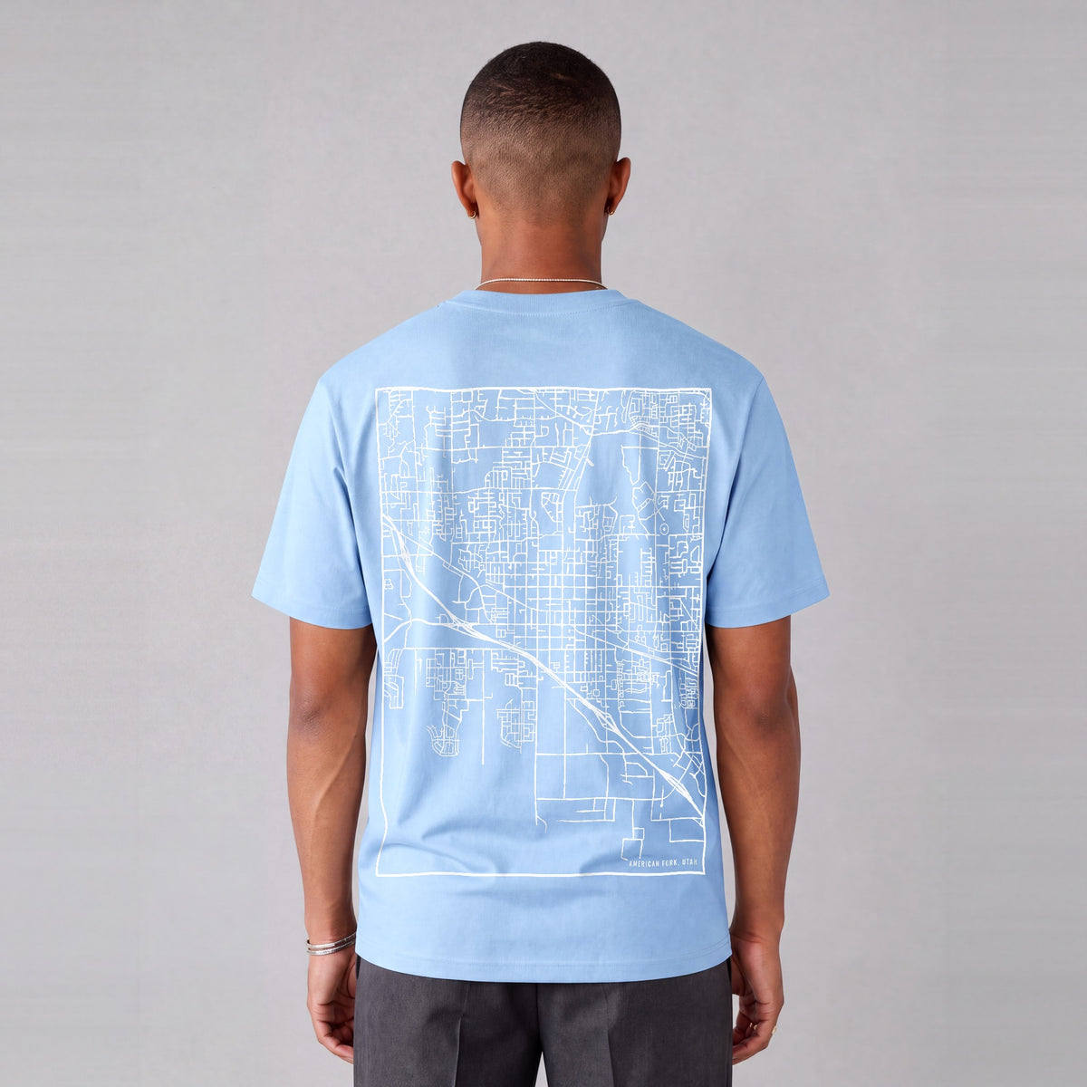 American Fork map tee, back print on model - Light Blue