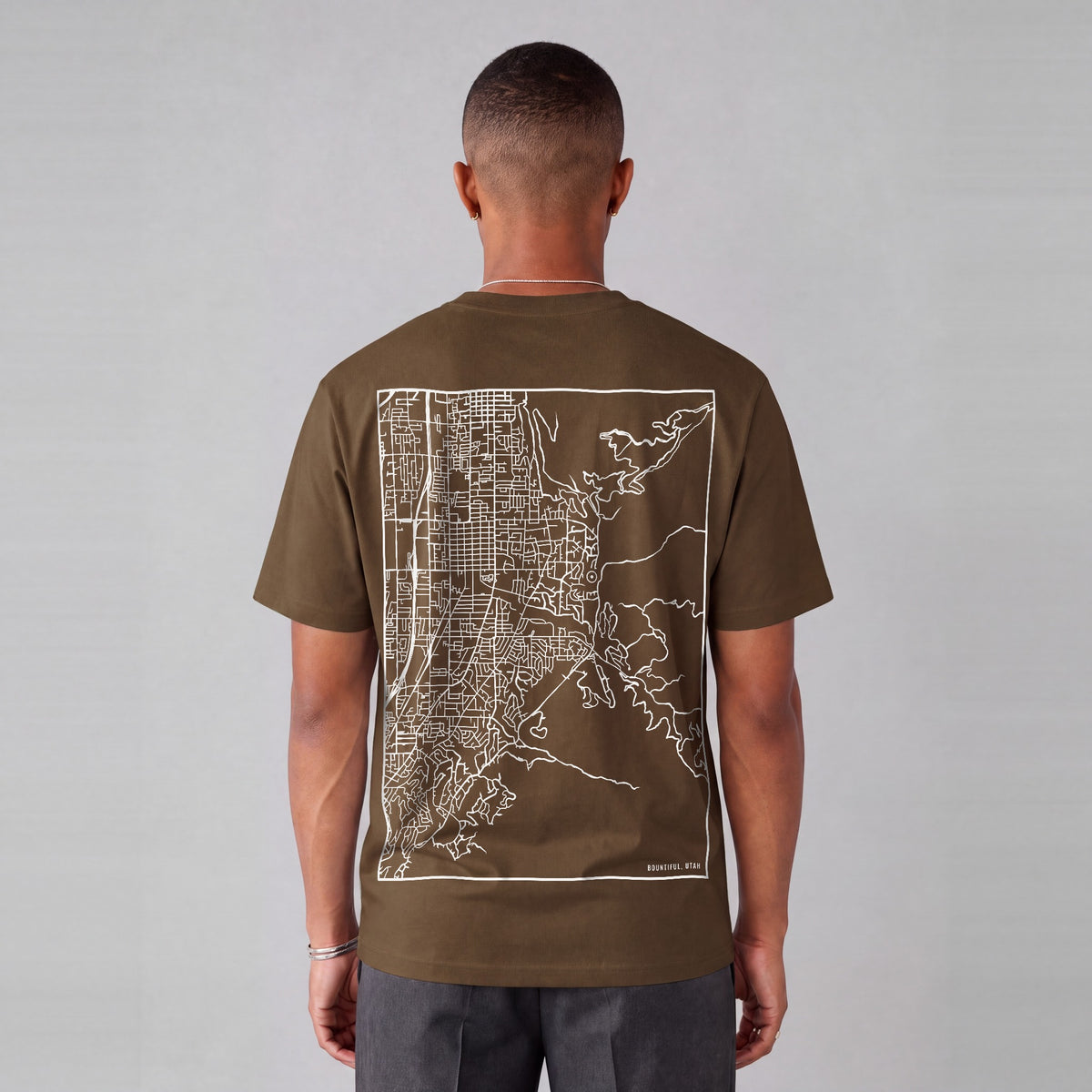 Bountiful map tee, back print on model - Coffee