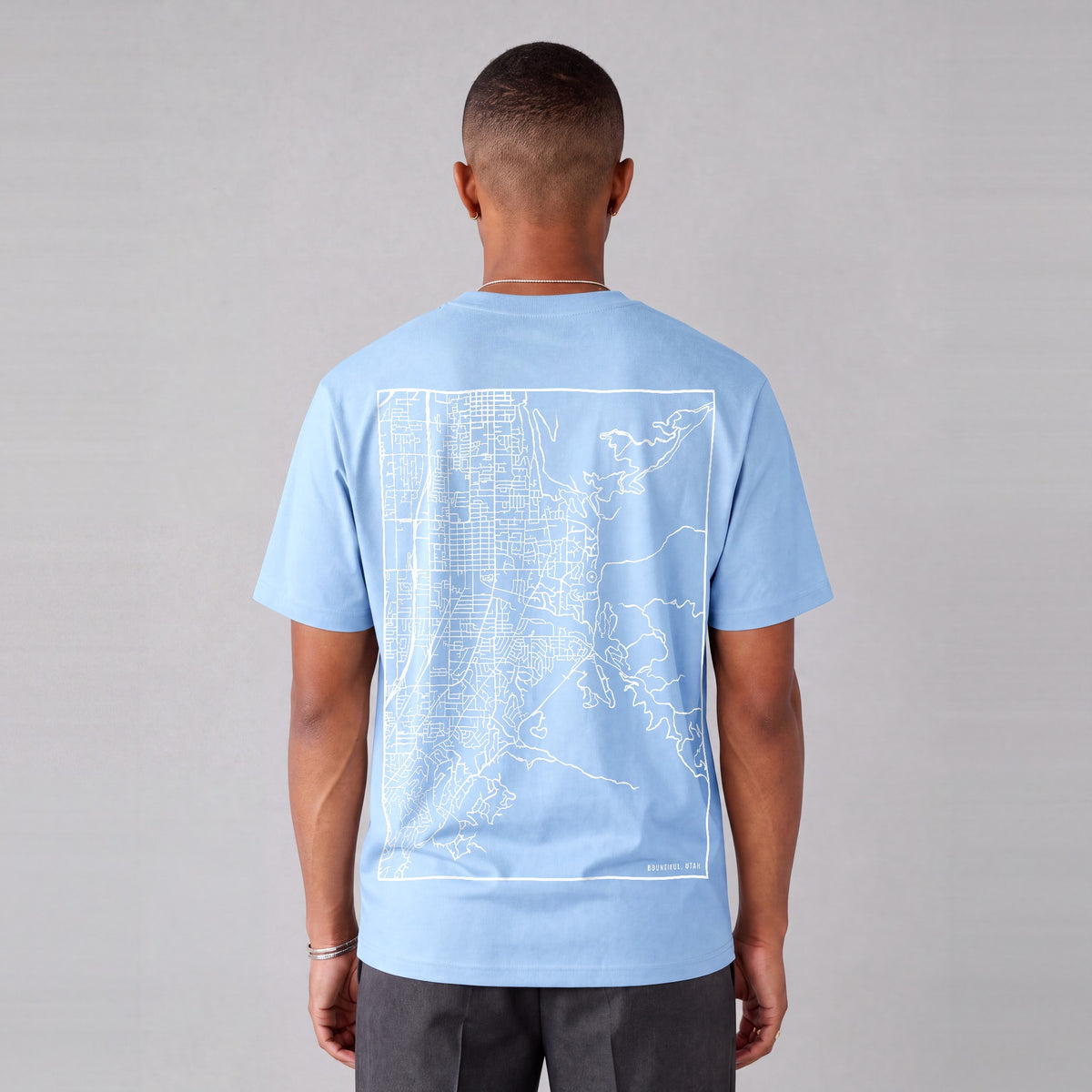 Bountiful map tee, back print on model - Light Blue