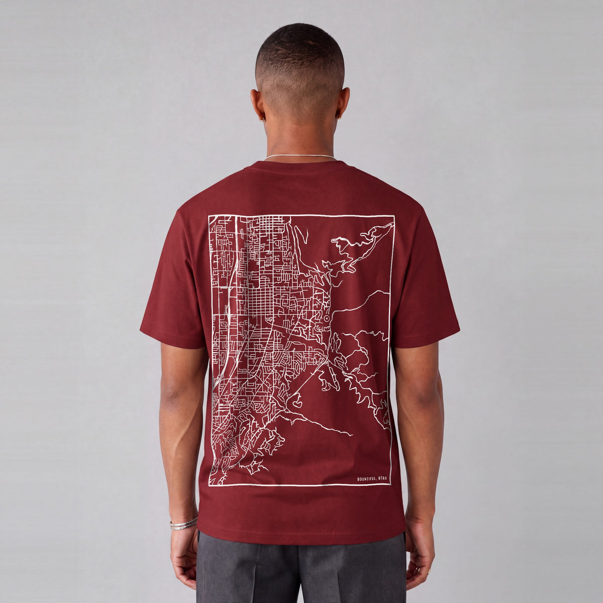 Bountiful map tee, back print on model - Maroon