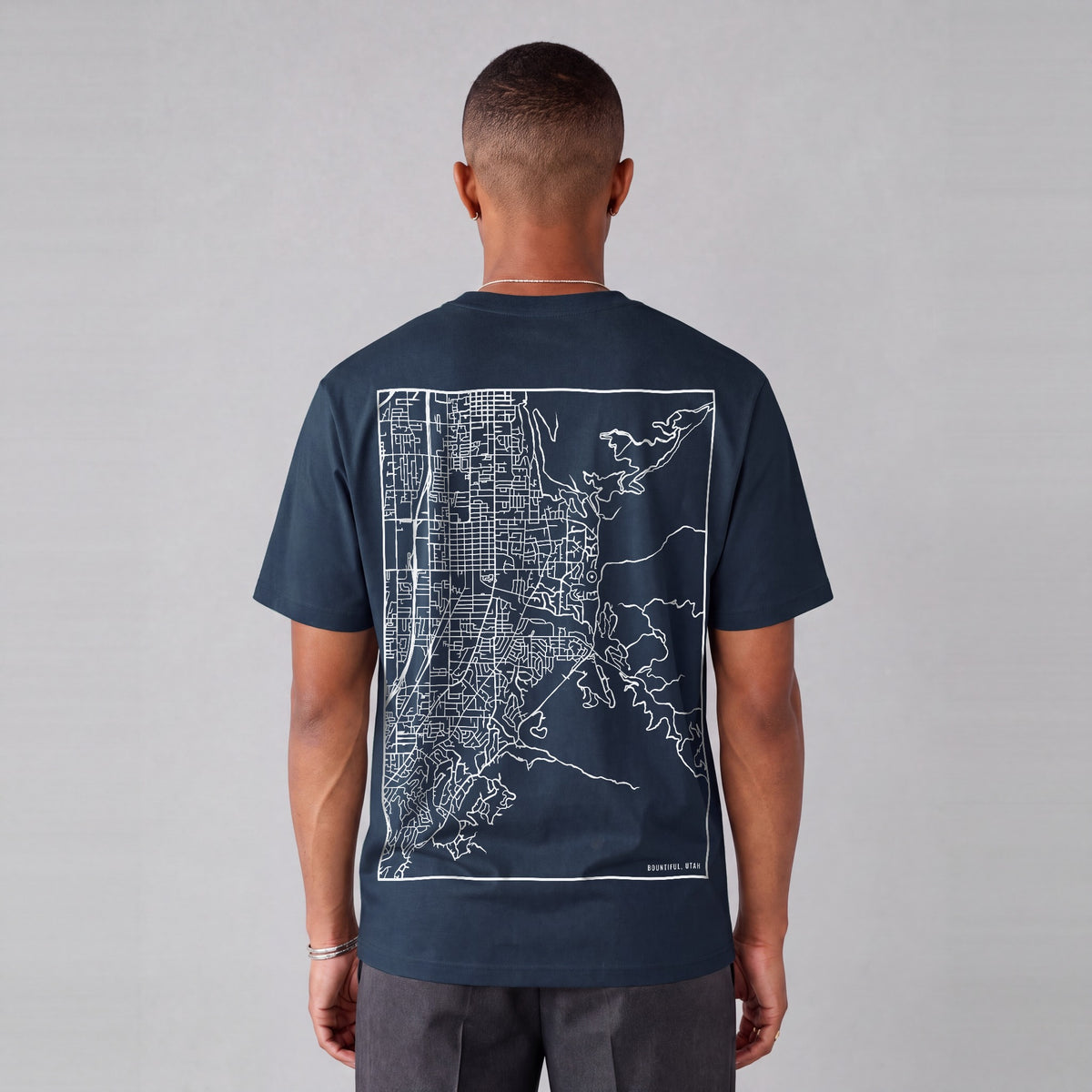 Bountiful map tee, back print on model - Navy Blue