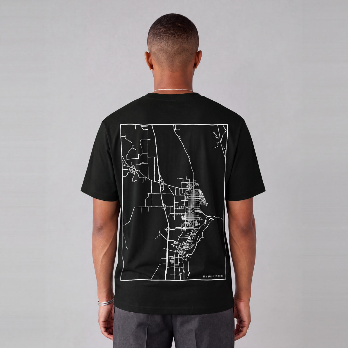 Brigham City map tee, back print on model - Black