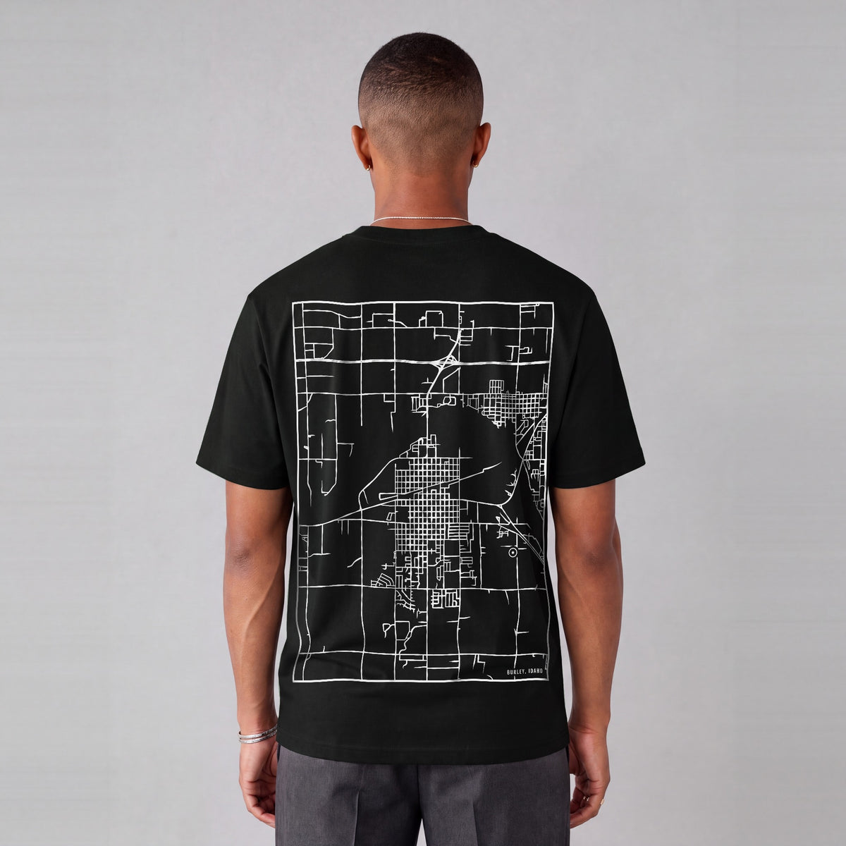 Burley map tee, back print on model - Black
