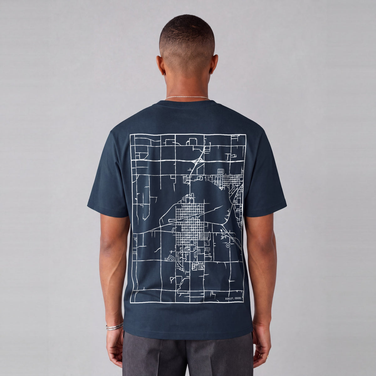 Burley map tee, back print on model - Navy Blue