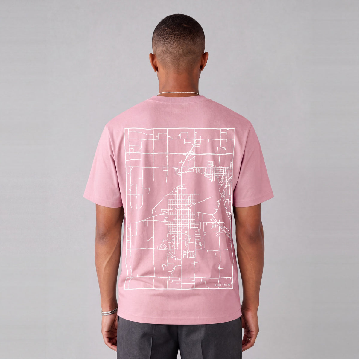 Burley map tee, back print on model - Pink