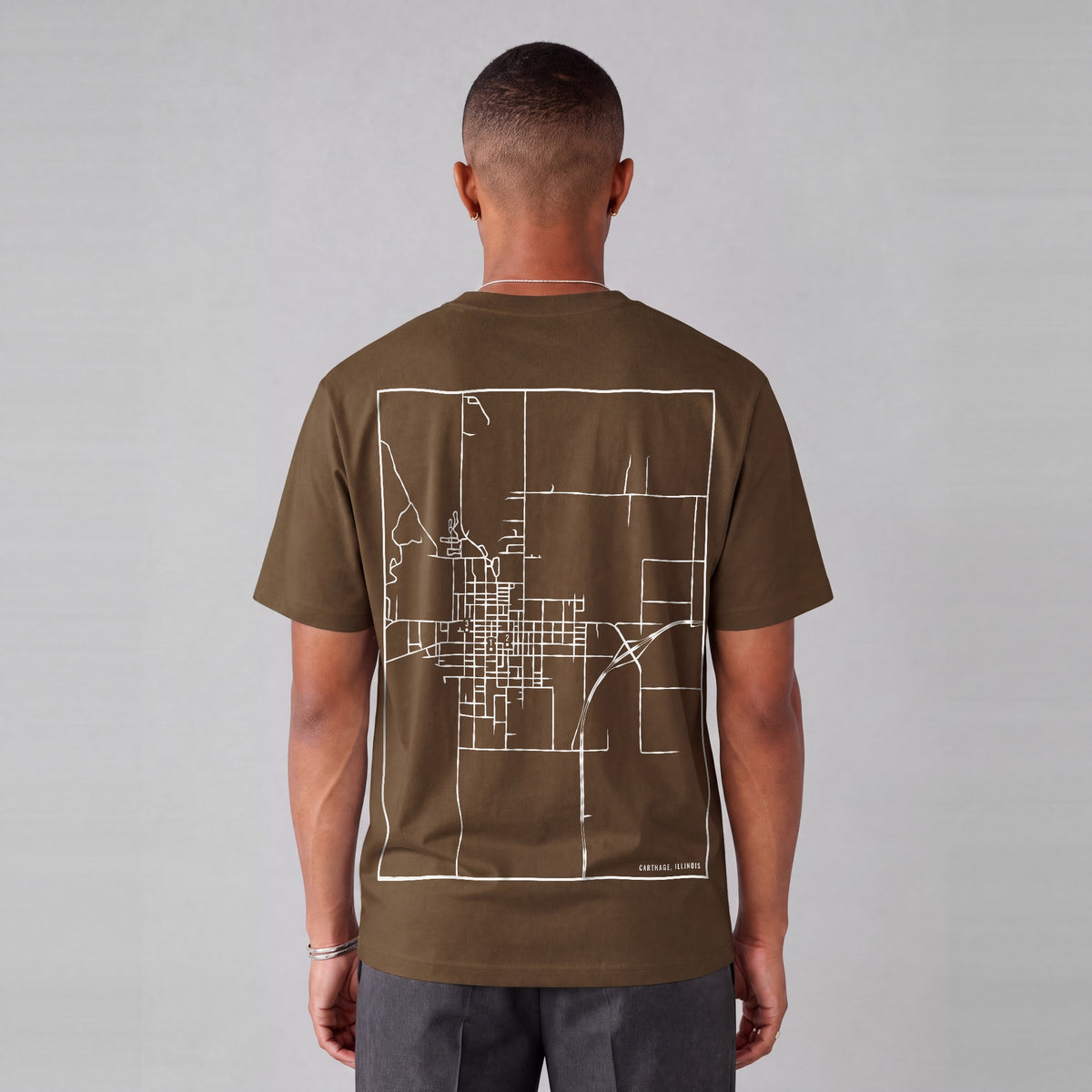Carthage map tee, back print on model - Coffee