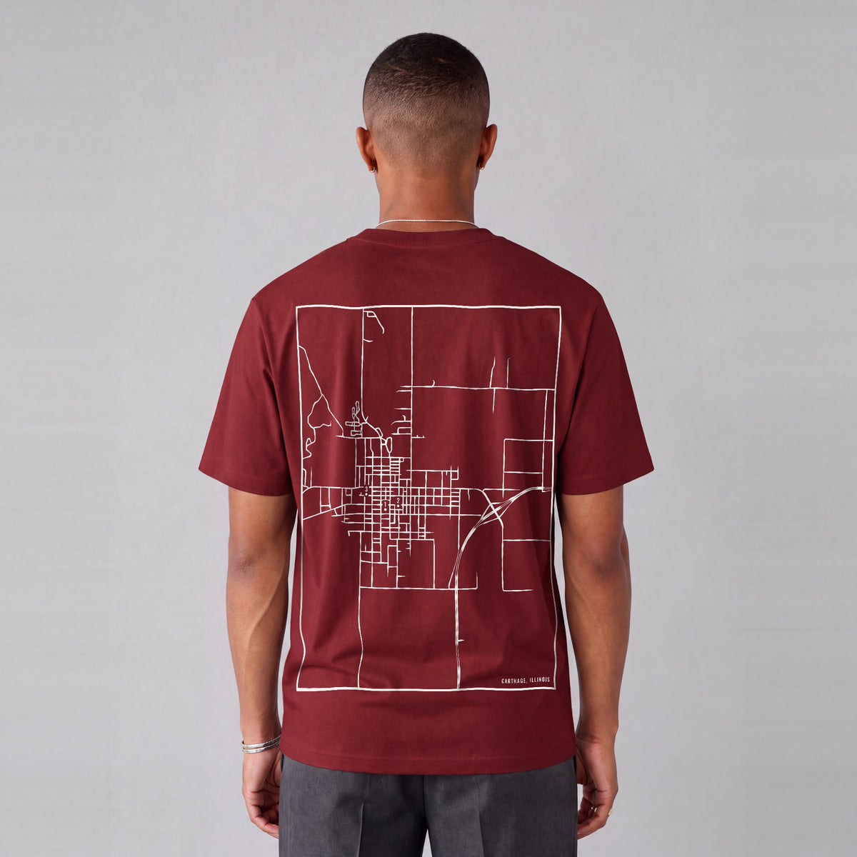 Carthage map tee, back print on model - Maroon