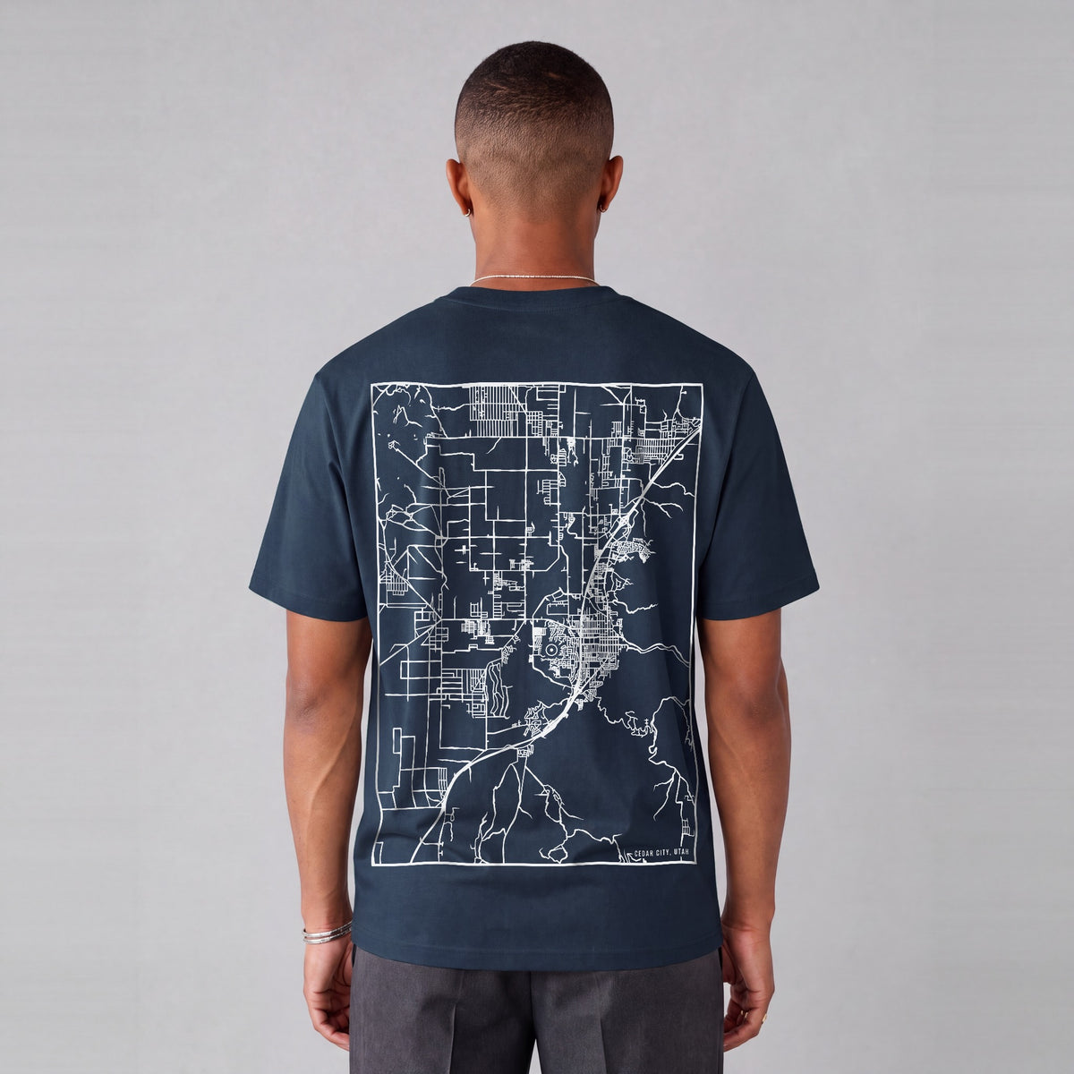 Cedar City map tee, back print on model - Navy Blue