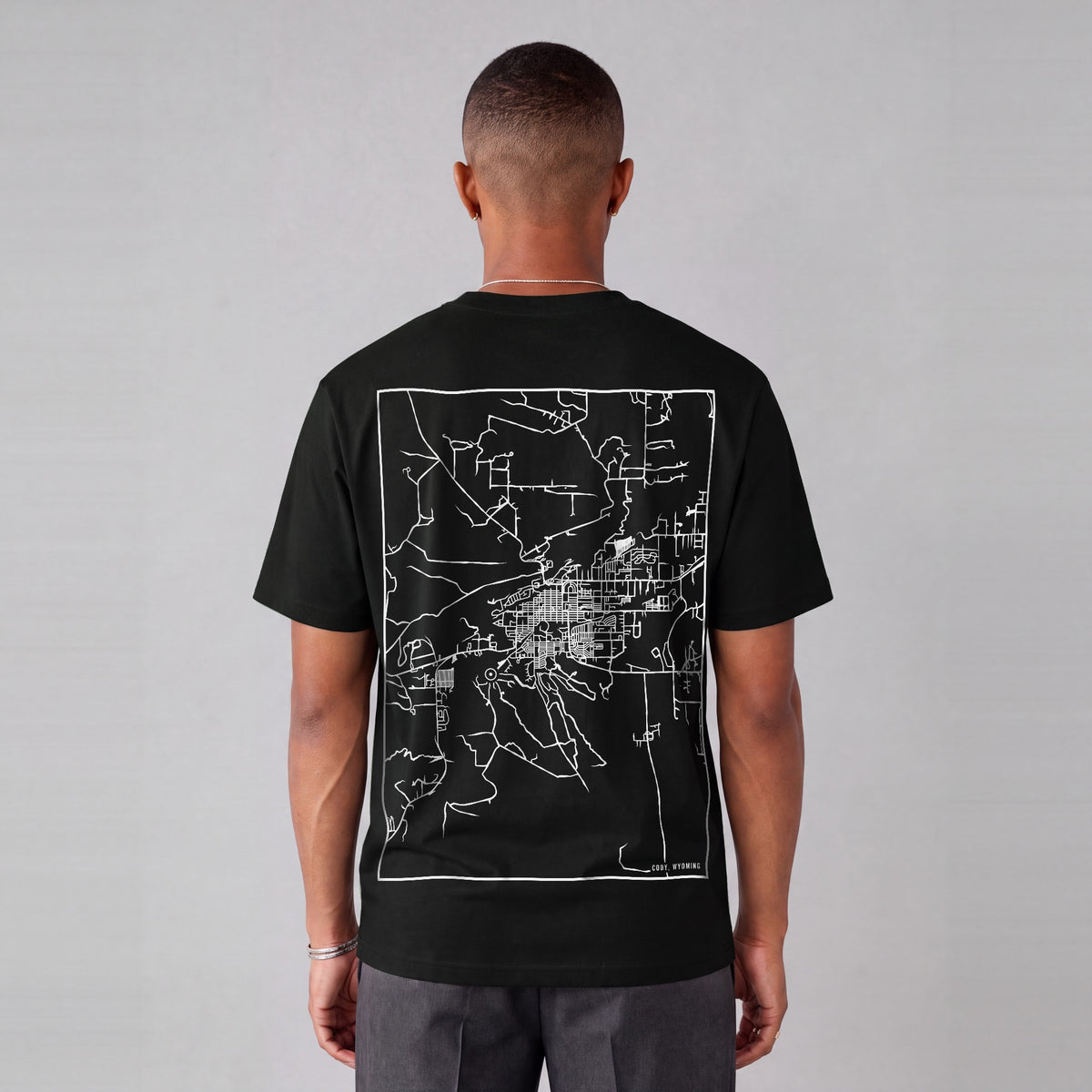 Cody map tee, back print on model - Black