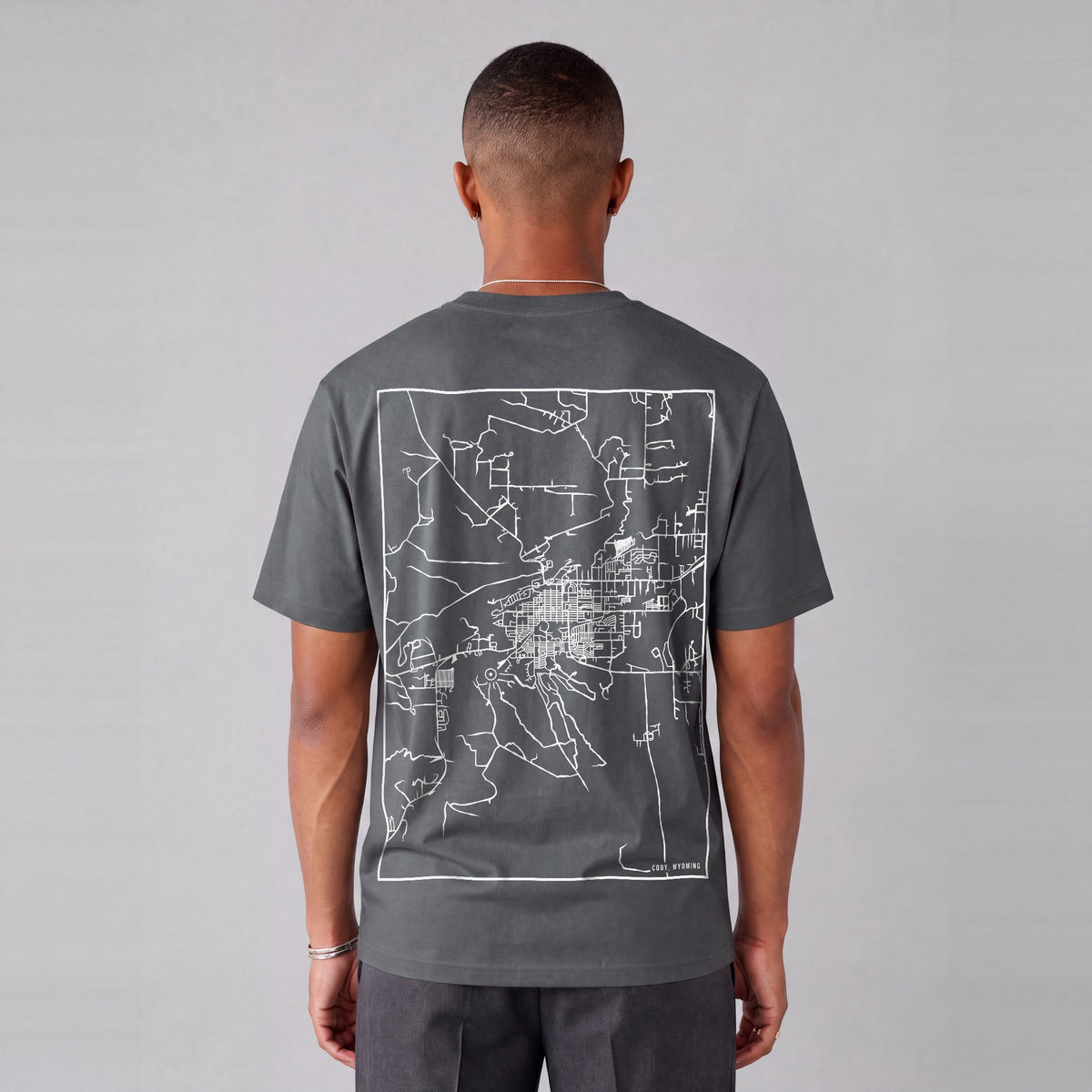 Cody map tee, back print on model - Charcoal