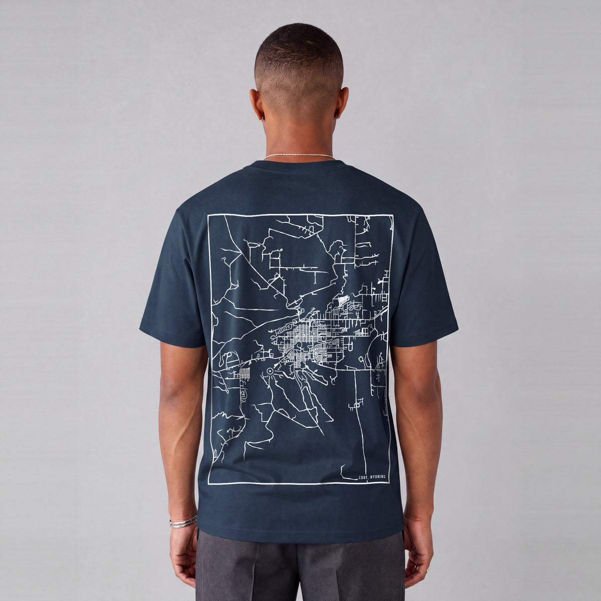 Cody map tee, back print on model - Navy Blue