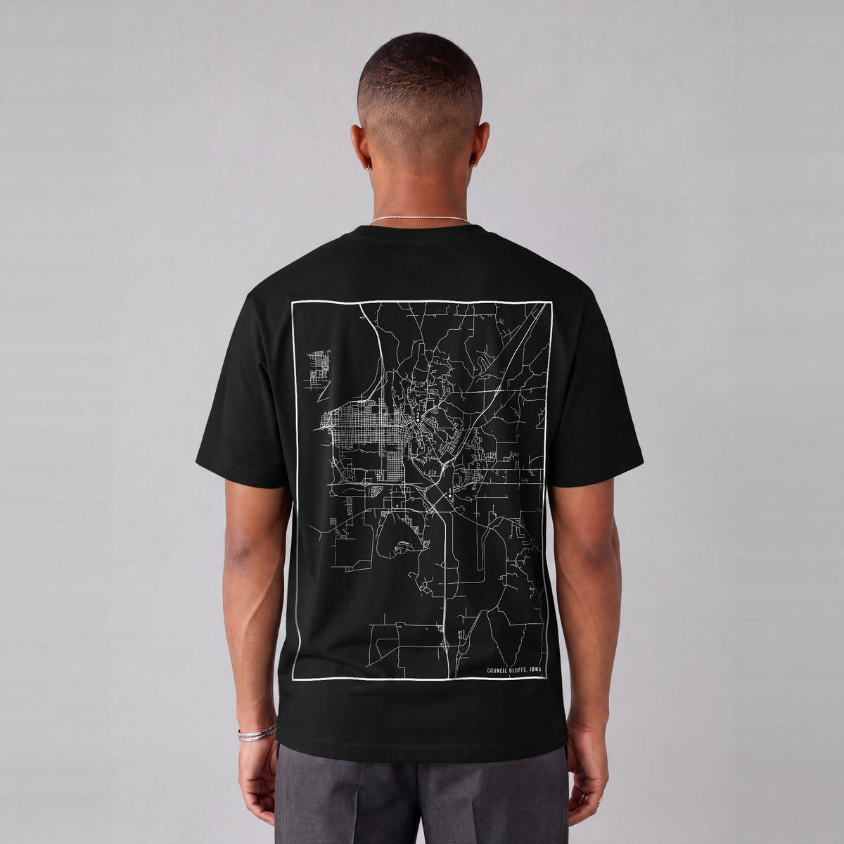 Council Bluffs map tee, back print on model - Black